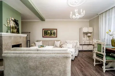 a living room with two beds and a couch at French House in Belgrade
