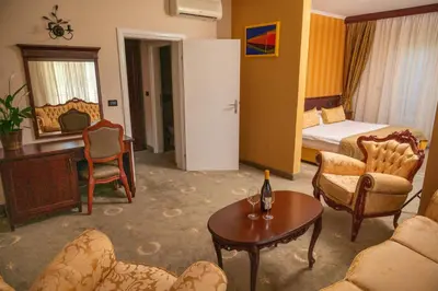 a living room with a couch and a table at Kaštel Ečka in Ečka