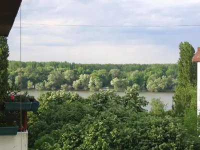 a view of a river from a house at Danube Apartment in Belgrade