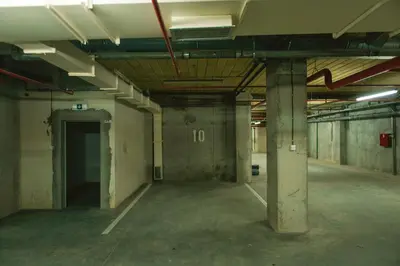 an empty parking lot in an old building at Maja Apartment in Belgrade