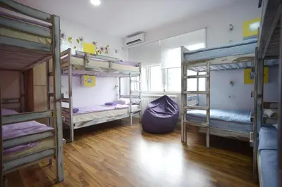 a room with three bunk beds in a room at Stella Di Notte in Belgrade