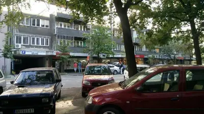 a group of cars parked on a city street at Apartment Zindan in Belgrade