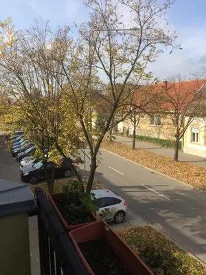 a view of a parking lot with cars parked at Aleksandar Apartment in Pančevo