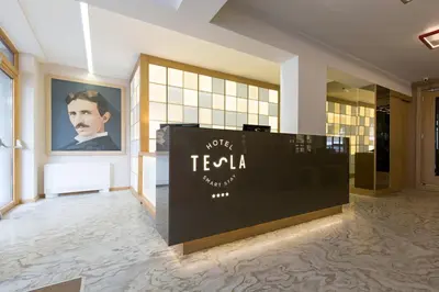 a hotel lobby with a sign that reads teola at Hotel TESLA - Smart Stay Garni in Belgrade