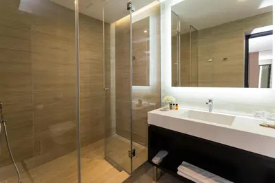 a bathroom with a sink and a shower at Dominic Smart & Luxury Suites - Republic Square in Belgrade
