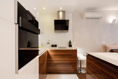 a kitchen with a sink and a counter top at Leo Modern Urban Stay, Self Check-In, Free Garage in Belgrade