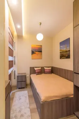 a bedroom with a bed in a room at 1A Moment Apartment in Belgrade
