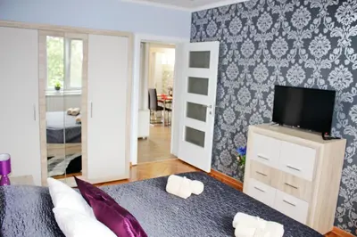 a room with a bed and a tv and a bedroom at Kristi Lux Apartment Center Free Parking Fast WiFi in Belgrade