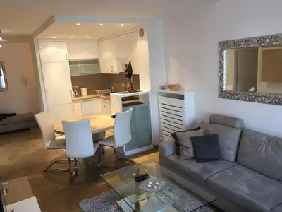 a living room with a couch and a table at Apartment Gorki in Belgrade