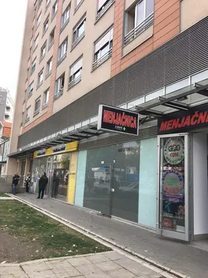 a store on the side of a building at Apartment Gorki in Belgrade