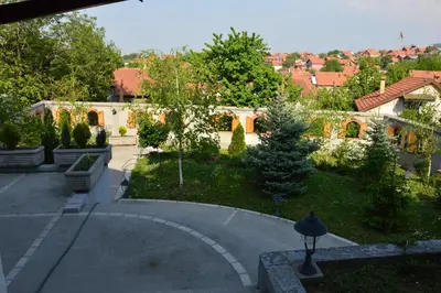 an aerial view of a garden with trees and buildings at Villa Stella Smederevo in Smederevo