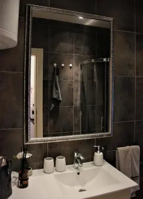 a bathroom with a sink and a mirror at Apartment Skadarlija FREE parking in Belgrade