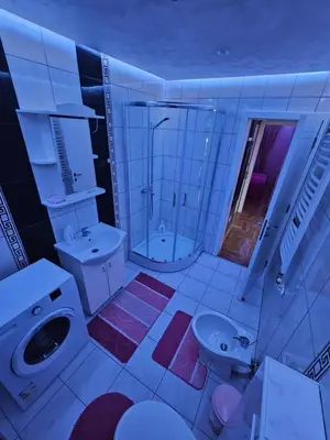 a bathroom with a toilet sink and a shower at Luxury Apartments Belgrade in Belgrade