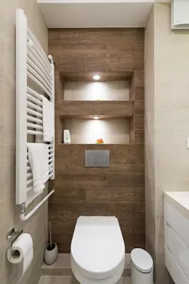 a small bathroom with a toilet and a sink at Vivio Luxury Apartment in Belgrade