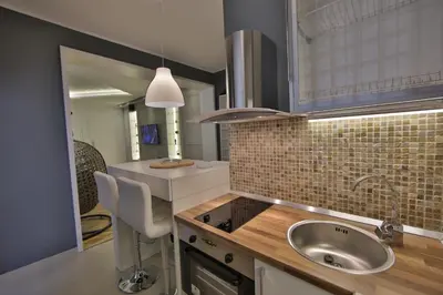 a kitchen with a sink and a counter top at Apartment Alek in Belgrade