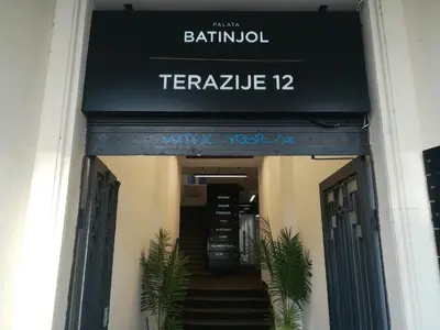 a entrance to a building with a sign that reads bathtub terayauce at Apartment Luna Terazije in Belgrade