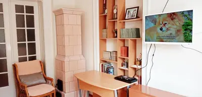 a living room with a desk and a tv at Belgrade Apartment Happy Garden in Belgrade