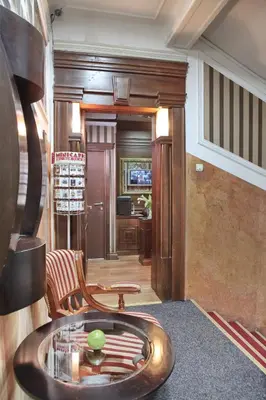 a living room with a tub in the middle of a room at Vila Terazije in Belgrade