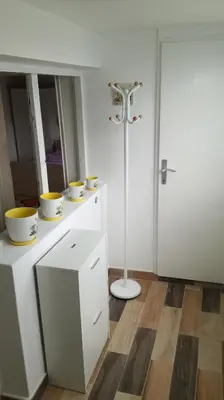 a room with a counter with bowls on it at Apartment Aqua Royal in Arandjelovac