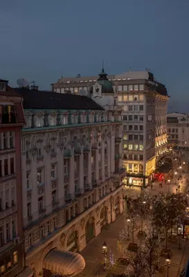 a large building in a city at night at Hotel Majestic in Belgrade