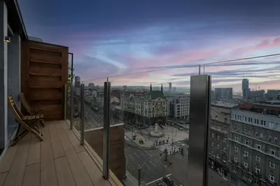 a balcony with a view of a city at Eden Luxury Suites Terazije in Belgrade