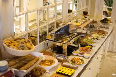 a buffet line with many different types of food at Xenon Hotel & SPA in Belgrade