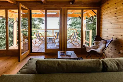 a living room with a couch and a table at Laguna Platz in Sremski Karlovci