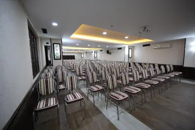 a row of chairs lined up in a room at Hotel Centar Balasevic in Belgrade