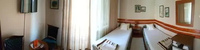 a room with a bed and a window at Guest House Major in Arandjelovac