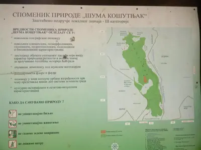 a sign with a map of the hyuanauanauticotin trail at Flat Kosutnjak 9 in Belgrade