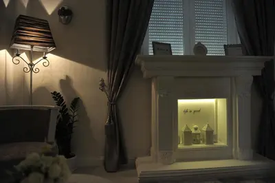a room with a lighted display in a window at Margot Luxury Studio in Belgrade