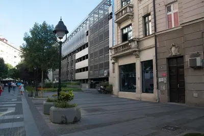 a city street with a street light and buildings at Double Decker Apartment in Belgrade