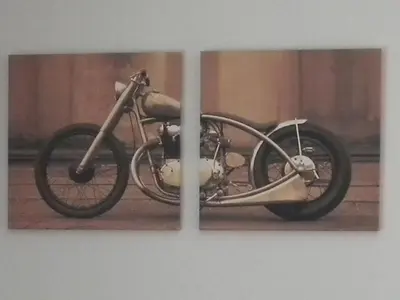 a picture of a motorcycle parked on a wall at Apartment Srebrni oblak in Arandjelovac