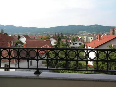 a view of a city from a balcony at Apartment Srebrni oblak in Arandjelovac