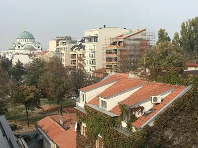 an overhead view of a city with buildings and roofs at Apartment Posejdon in Belgrade
