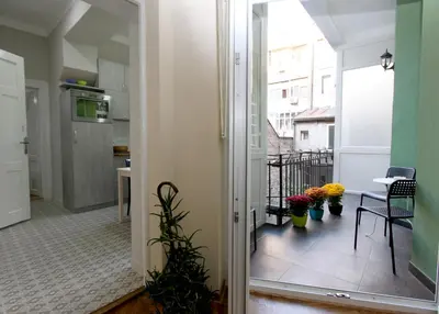 a view from the hallway of a apartment with a balcony at City Center Apartment MIKA in Belgrade