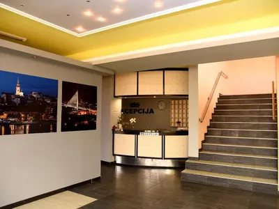 a staircase in a building with a view of a city at B&B Queen in Belgrade