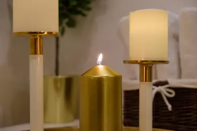 two candles sitting on top of a table at Central Business Apartments Jacuzzi in Belgrade