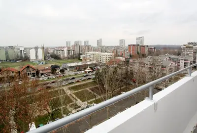a view of a city from a balcony at Penthouse Novi Beograd in Belgrade