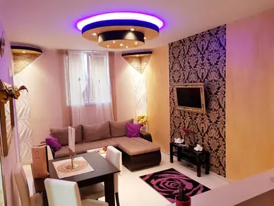 a living room with a couch and a table at Gold in Belgrade