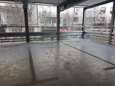 an empty parking lot with a view of a building at Dafni Apartment in Belgrade
