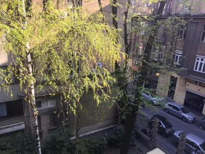 a view from a window of a city street with cars at Apartment Jastuk in Belgrade