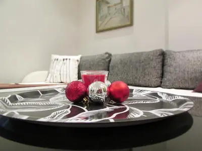 a table with two balls and a glass on it at Apartment B&S in Belgrade