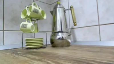 a kitchen counter with a mixer on a counter top at Apartment B&S in Belgrade