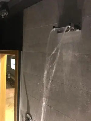 a stream of water coming out of a wall at Subway in Belgrade