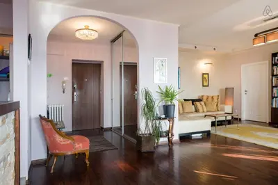 a living room with a couch and a chair at Roof Penthouse 15th Floor in Belgrade