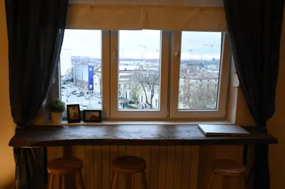 a window with a view of a city at Charming Flat with Soul in Belgrade