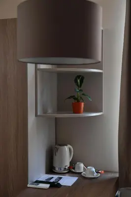 a potted plant sitting on a shelf in a kitchen at Apartments Srbija - FREE PARKING in Belgrade