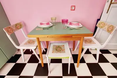 a dining room with a table and two chairs at Apartment Dorcol in Belgrade
