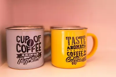 two coffee mugs sitting next to each other at Apartment Dorcol in Belgrade